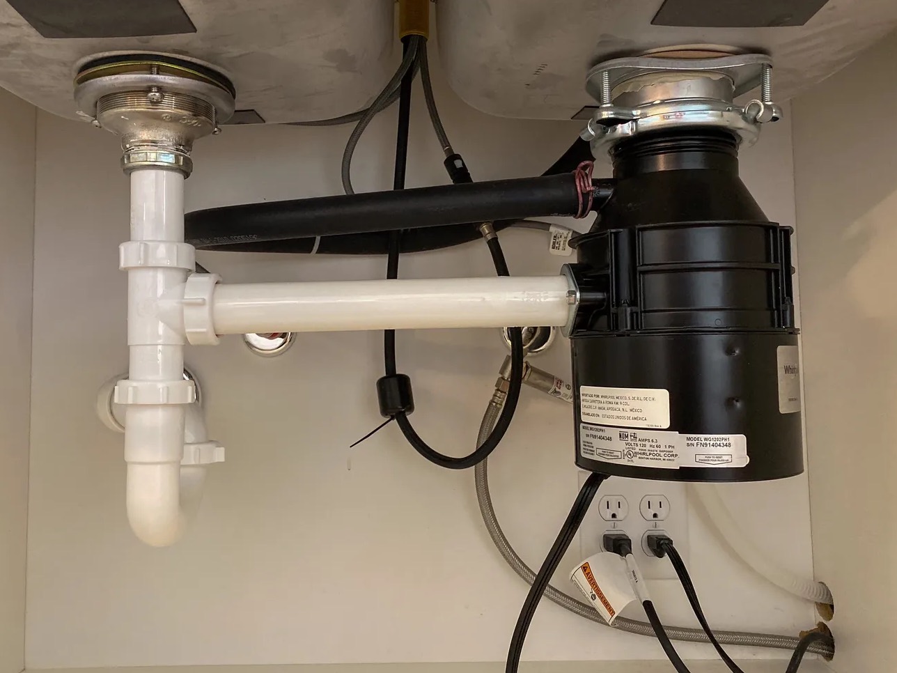 Leaky Garbage Disposal Cleanup in Newton, MA